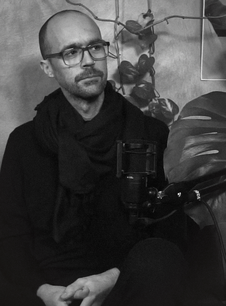 A black and white portrait of Ian Alan Paul